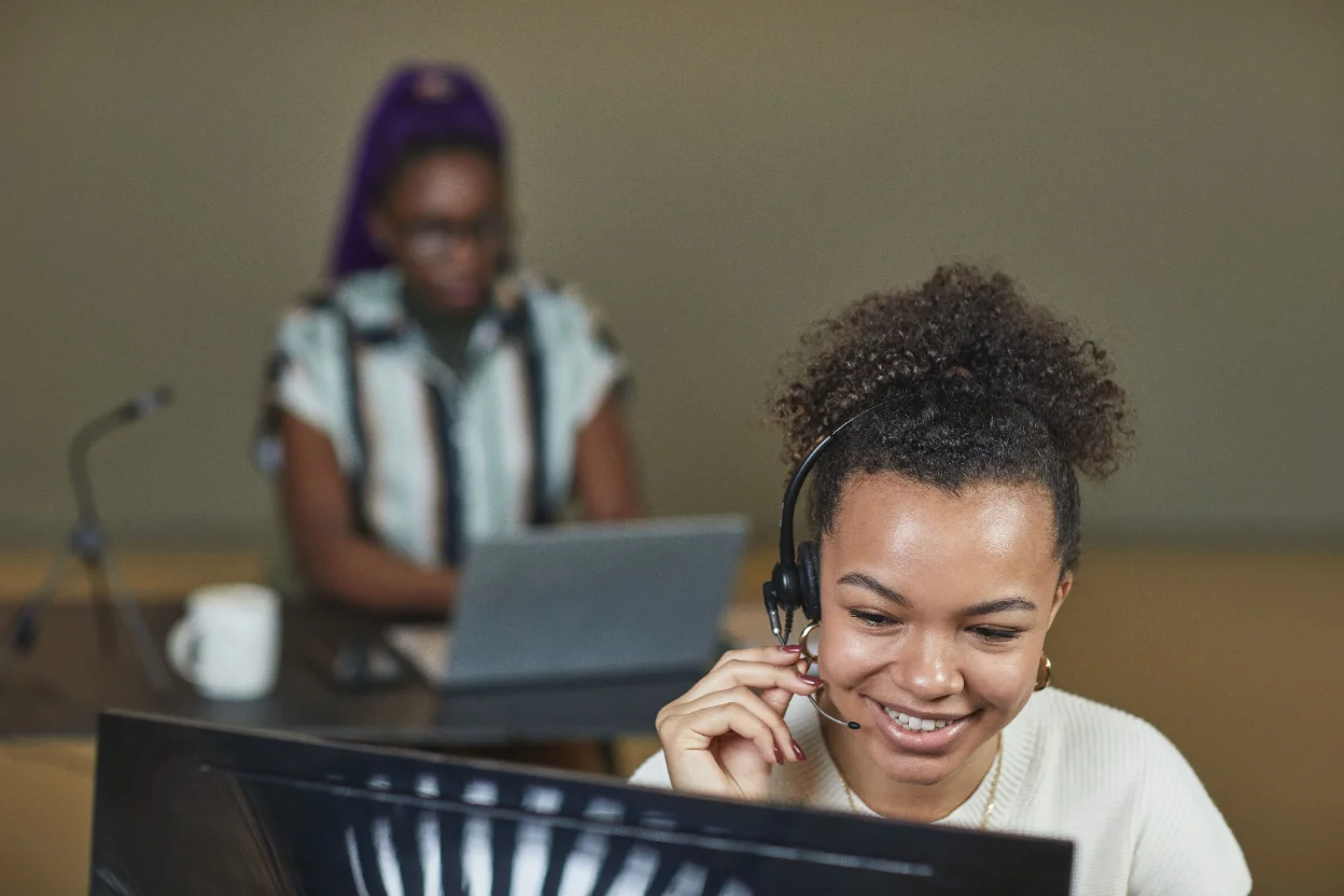 Vision Corporation customer support specialist assisting a client